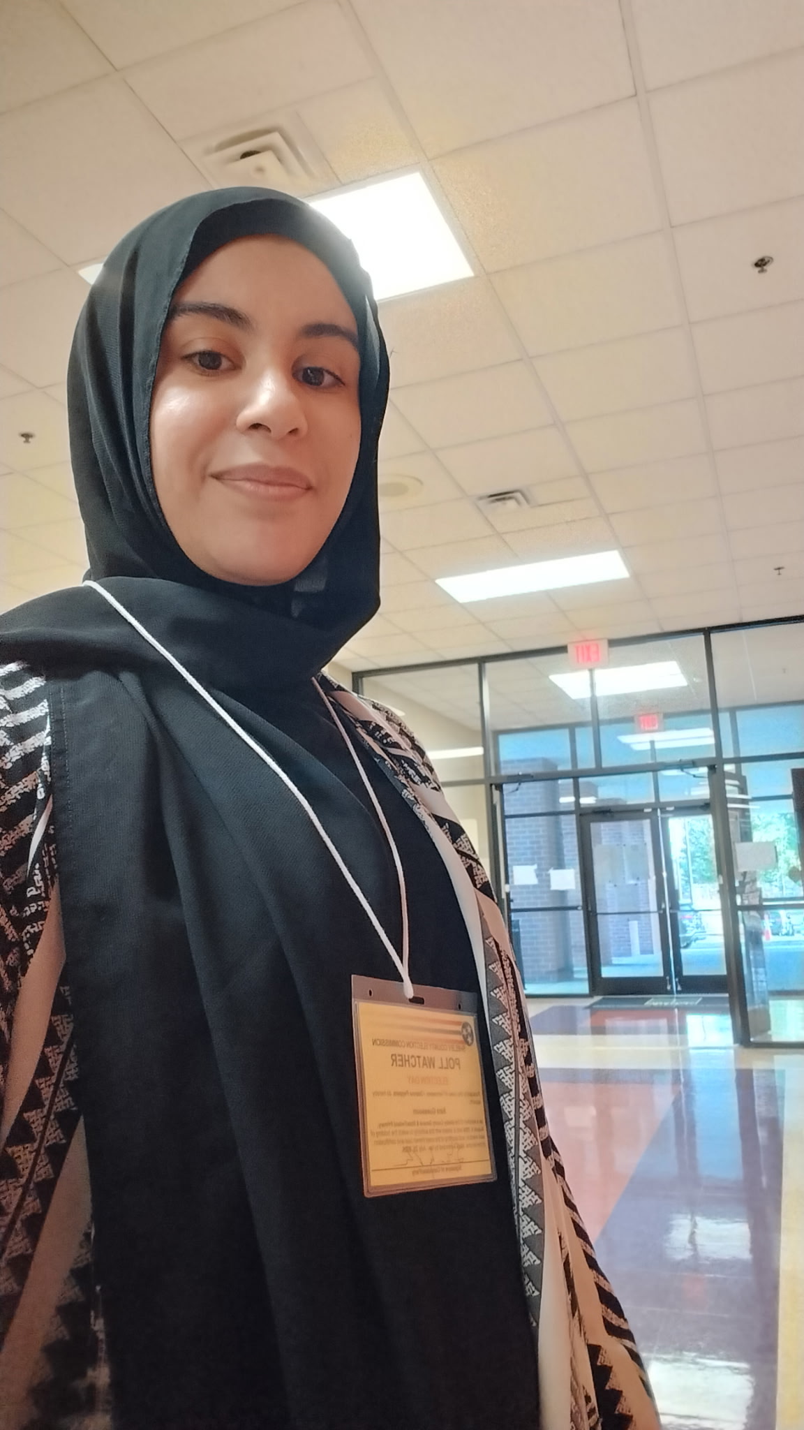 A poll watcher volunteering inside a Tennessee voting location